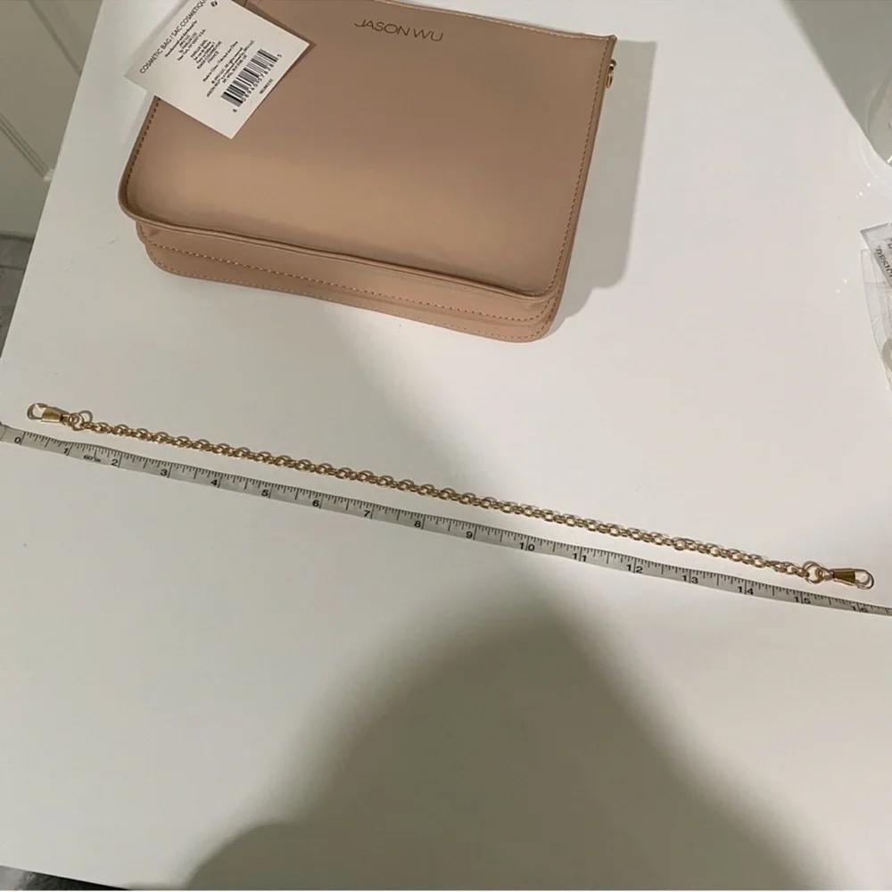 Authentic Jason Wu cosmetic beauty pouch converted to a crossbody bag